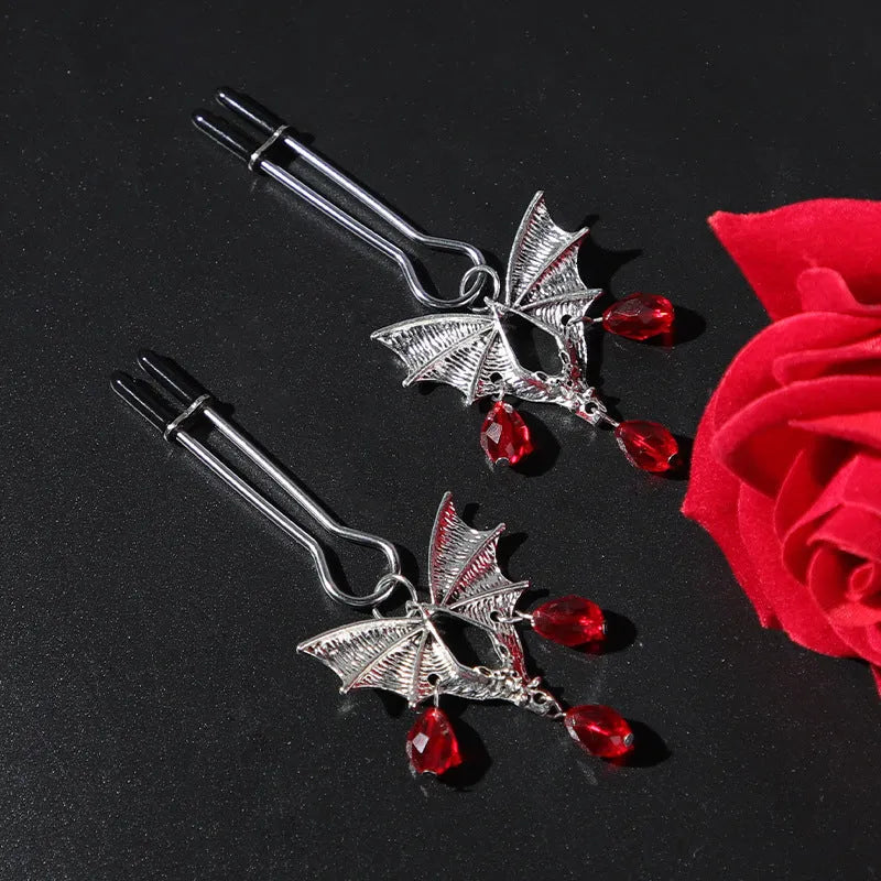 Silver bat-shaped adjustable nipple clamp with alloy construction and clip mechanism