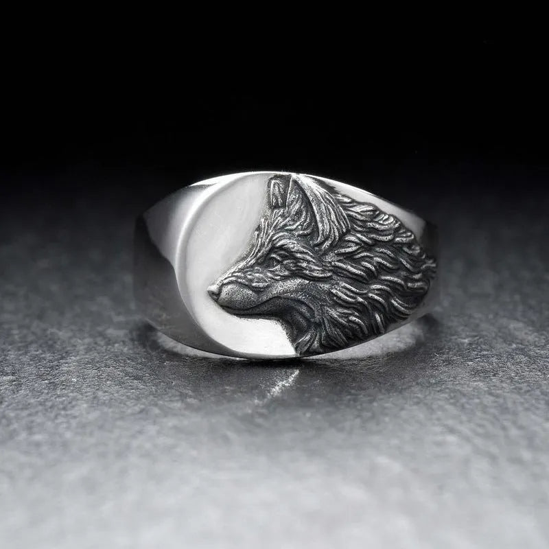 Men's silver geometric wolf head ring showing detailed alloy construction and clean angular lines