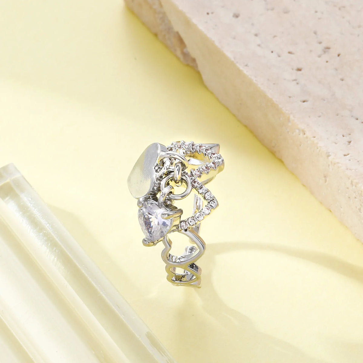 Heart-shaped open ring in white K electroplated copper with love-heart design and adjustable band