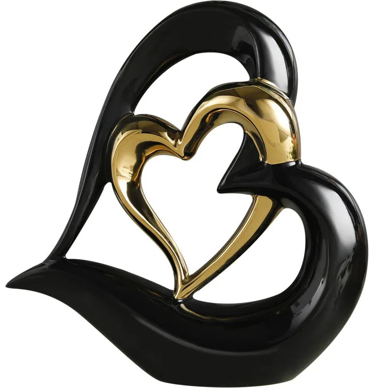 White porcelain love heart ornament with geometric design in metallic finish, approximately 19cm in size