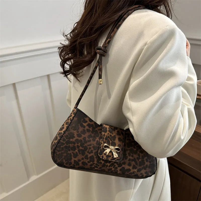 Casual women's handbag with sandwich pocket design in black, brown, coffee, or khaki colour options