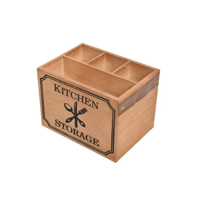 Wooden kitchen storage box with internal grid divider for organising knives, forks, and chopsticks.