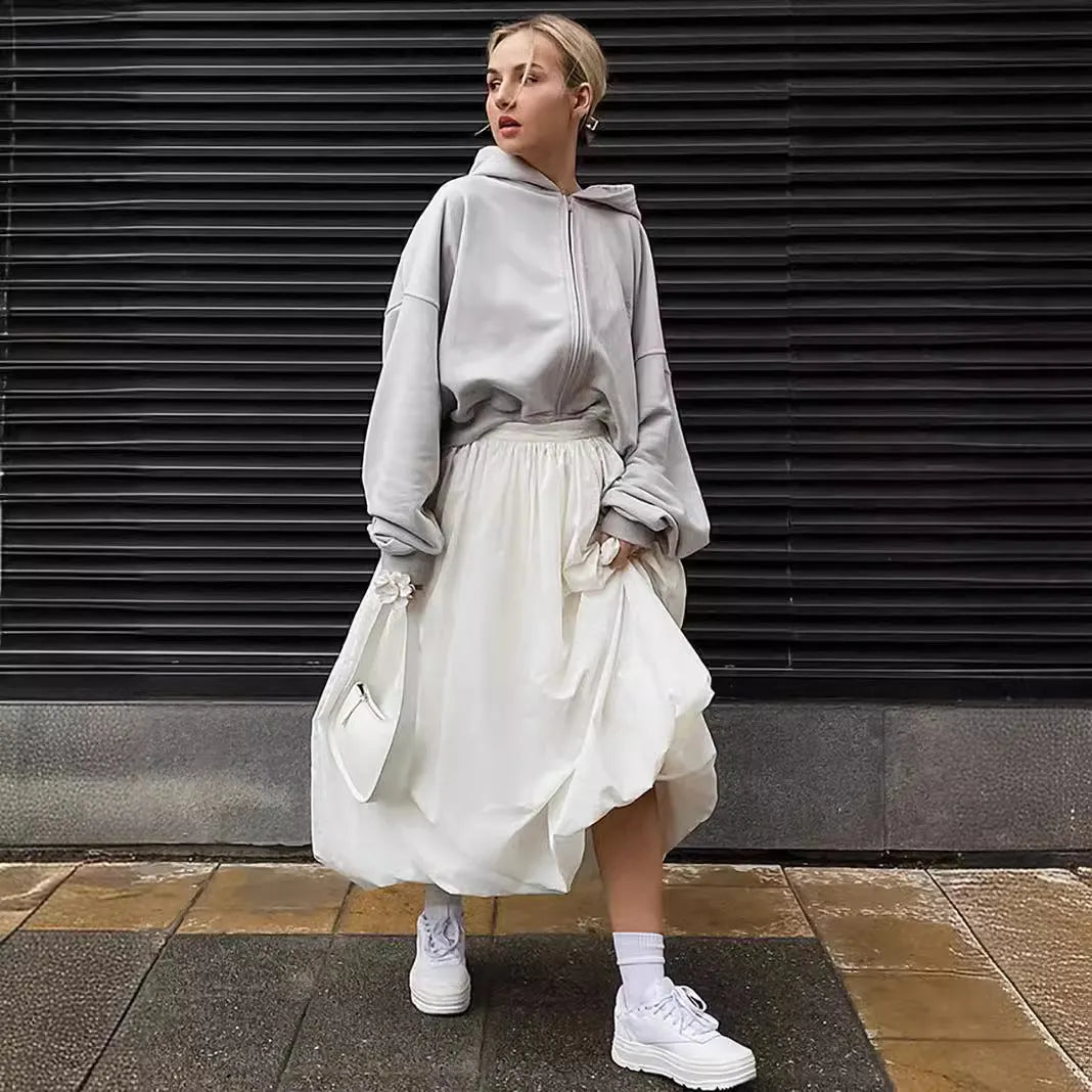 Women's solid colour long cotton skirt in white or black, casual girlish style.