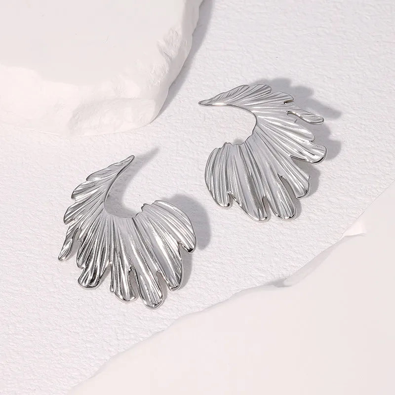 Stainless steel leaf earrings with electroplated finish in gold or steel colour options
