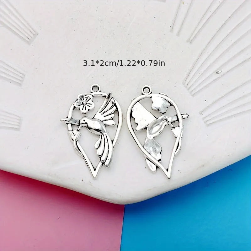 Alloy magpie pendant with electroplated finish measuring 2.5cm height for DIY jewellery making