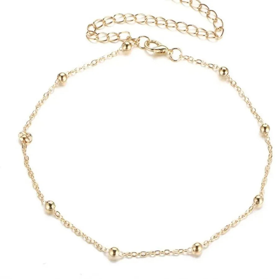 Women's bohemian anklet with geometric pendant on twisted chain in gold electroplated finish