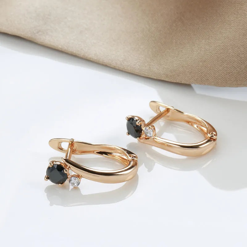 Gold geometric drop earrings with black agate stone inlay on copper setting, retro design