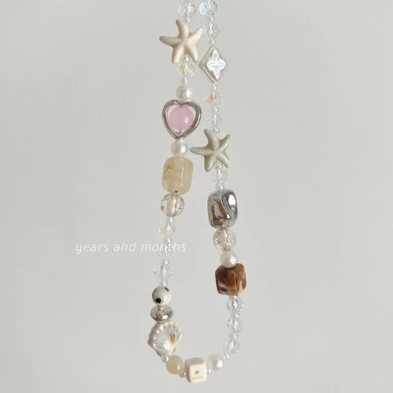 Bohemian sweetheart mobile phone charm with alloy beaded decoration in island sweetheart colour