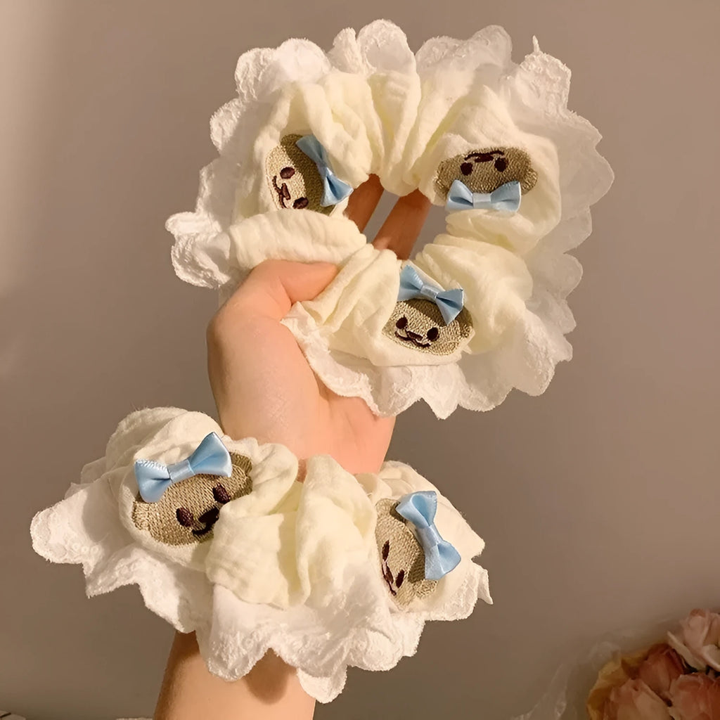 Blue cloth hair ring with bear motif and bowknot design on elastic band