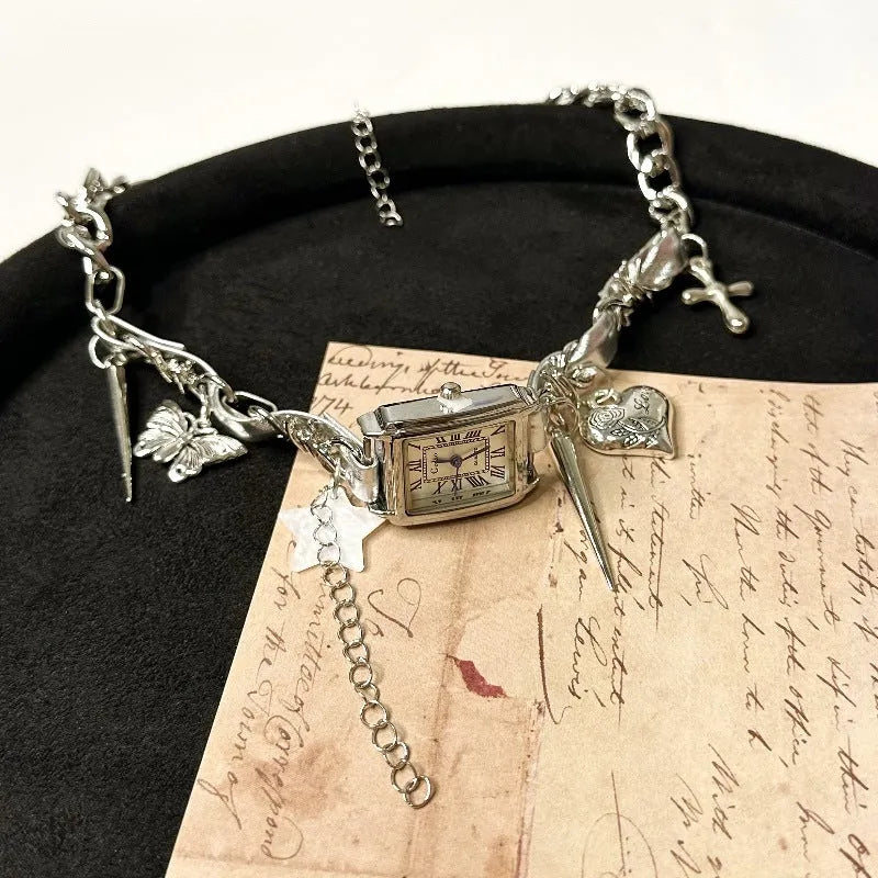 Dark multi-layer women's necklace with cross pendant and large hemp flower chain, adjustable length.