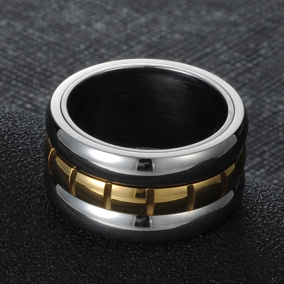 Gold titanium steel ring with rotating ultra-wide knuckle section shown in multiple size options