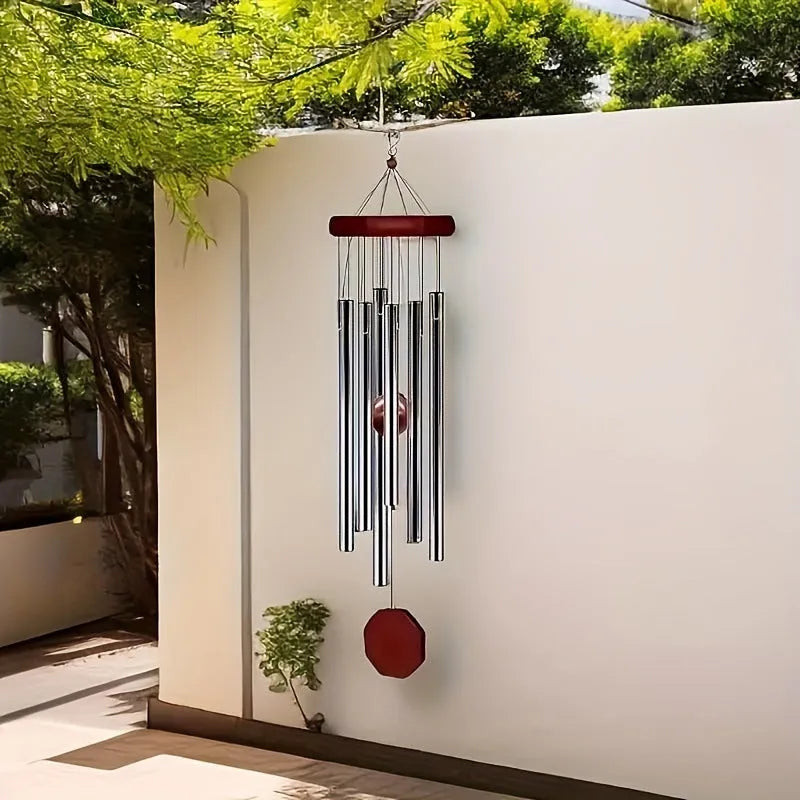 Retro-style metal wind pendant with rotating design in TL089 Clarinet colour.