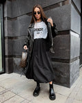 Women's solid colour long cotton skirt in white or black, casual girlish style.