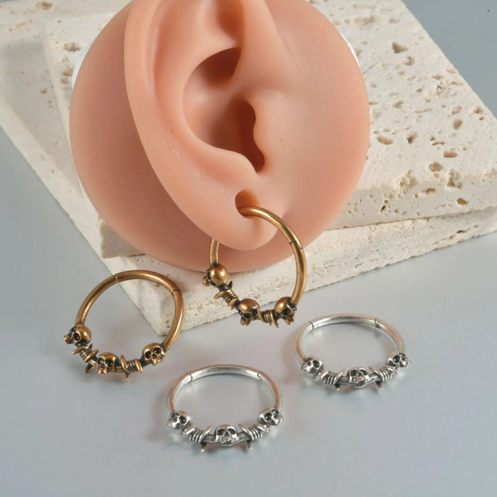 Vintage punk copper earrings with handcrafted ghost head designs in antique silver or gold finish