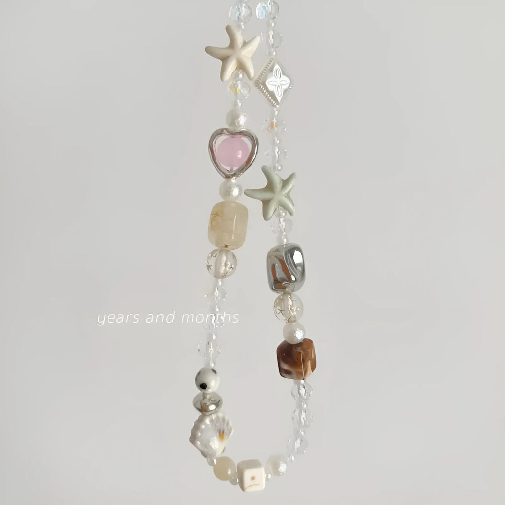 Bohemian sweetheart mobile phone charm with alloy beaded decoration in island sweetheart colour
