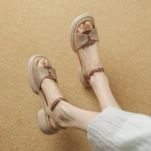 Women's khaki platform sandals with chunky heel and open toe design featuring renewable leather uppers