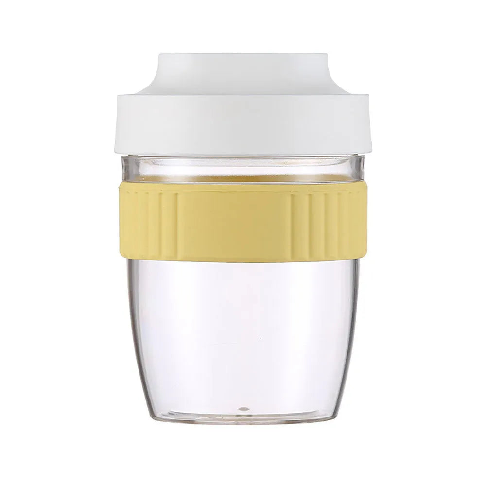Green plastic salad cup with attached spoon lid showing 480ml capacity measurement