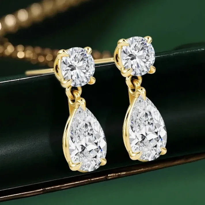 925 sterling silver moissanite stud earrings with round and water drop stones on gold or silver background