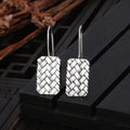 Silver geometric earrings with woven diamond plaid pattern, measuring 17.5mm by 11mm