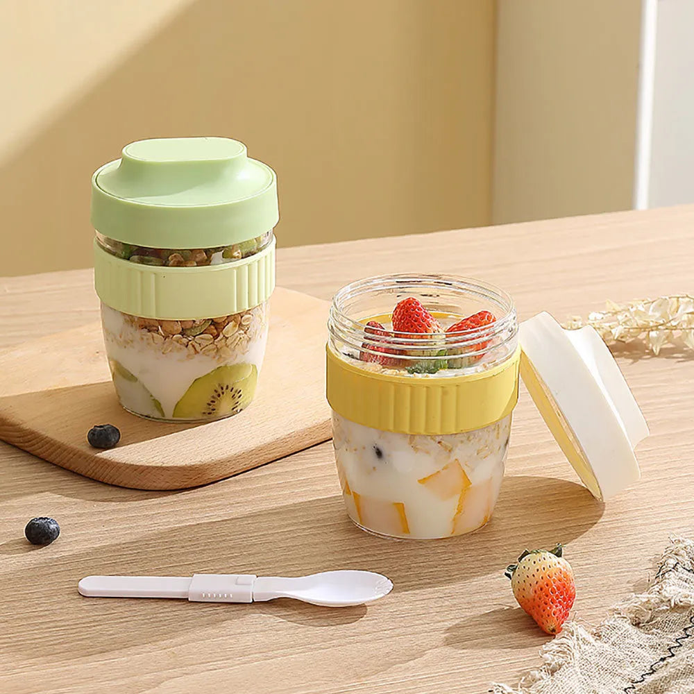 Green plastic salad cup with attached spoon lid showing 480ml capacity measurement