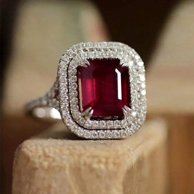 Copper rhinestone square princess ring in F827 red colour, showing geometric design and UK sizes 6-10.