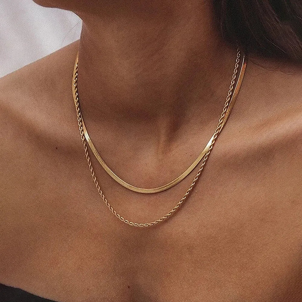 Adjustable double-layer twist necklace with geometric design on snake bones chain, showing 21-50cm length range