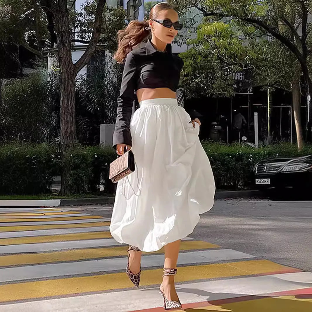 Women's solid colour long cotton skirt in white or black, casual girlish style.