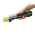 Green plastic handheld insect catcher measuring 30cm length for garden pest control