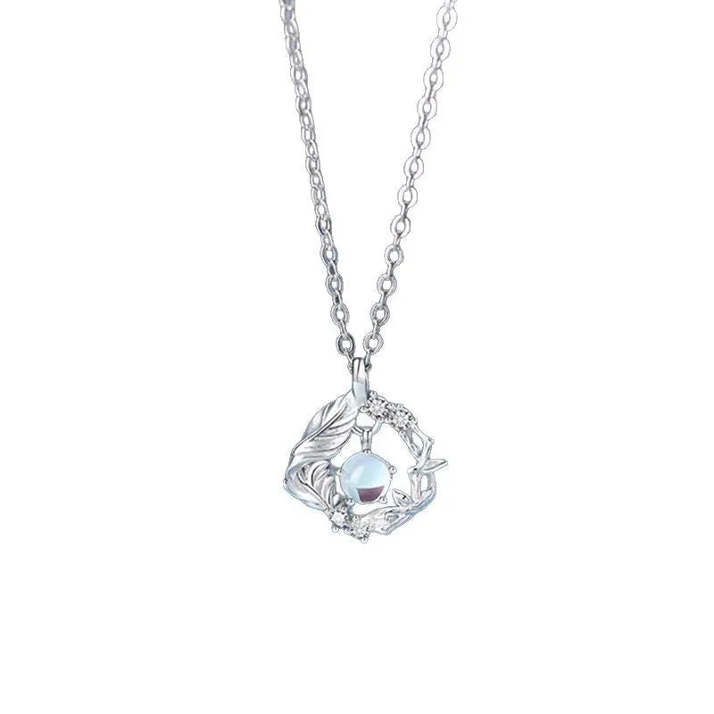 Women's adjustable tree and bird pendant necklace with geometric alloy design in blue eucalyptus colour