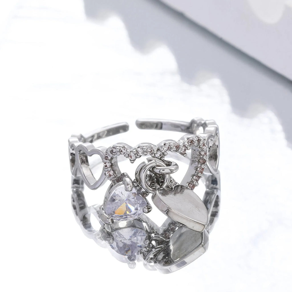 Heart-shaped open ring in white K electroplated copper with love-heart design and adjustable band