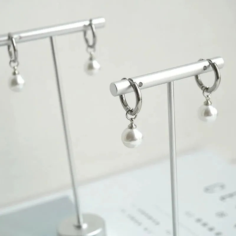Geometric women's pearl earrings with titanium steel posts and round accents
