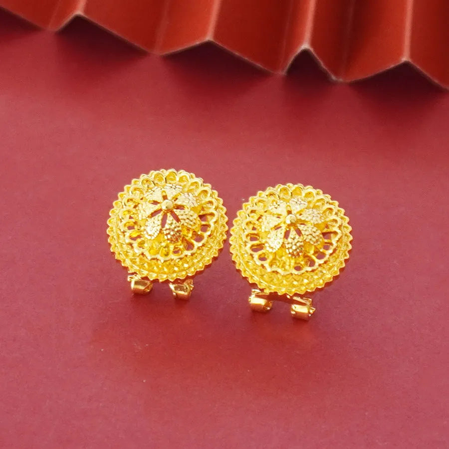 Gold-plated three-piece jewellery set with floral design, showing necklace, earrings, and ring with electroplated finish