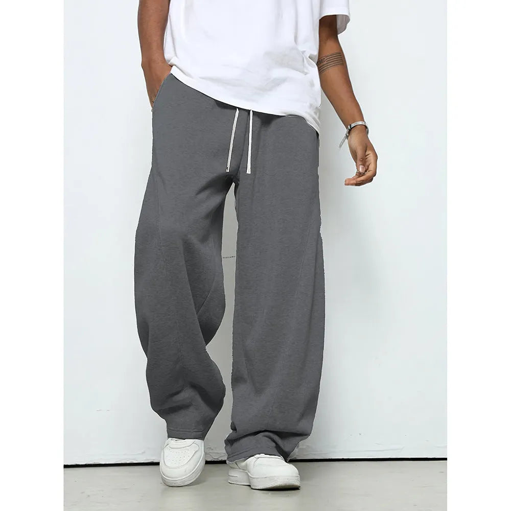 Men's straight leg casual trousers in polyester with micro-elastic waistband and drawstring closure, available in three colours.