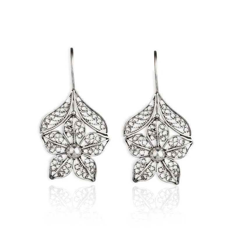 Silver retro hollow flower leaf-shaped alloy earrings for women with pierced fitting
