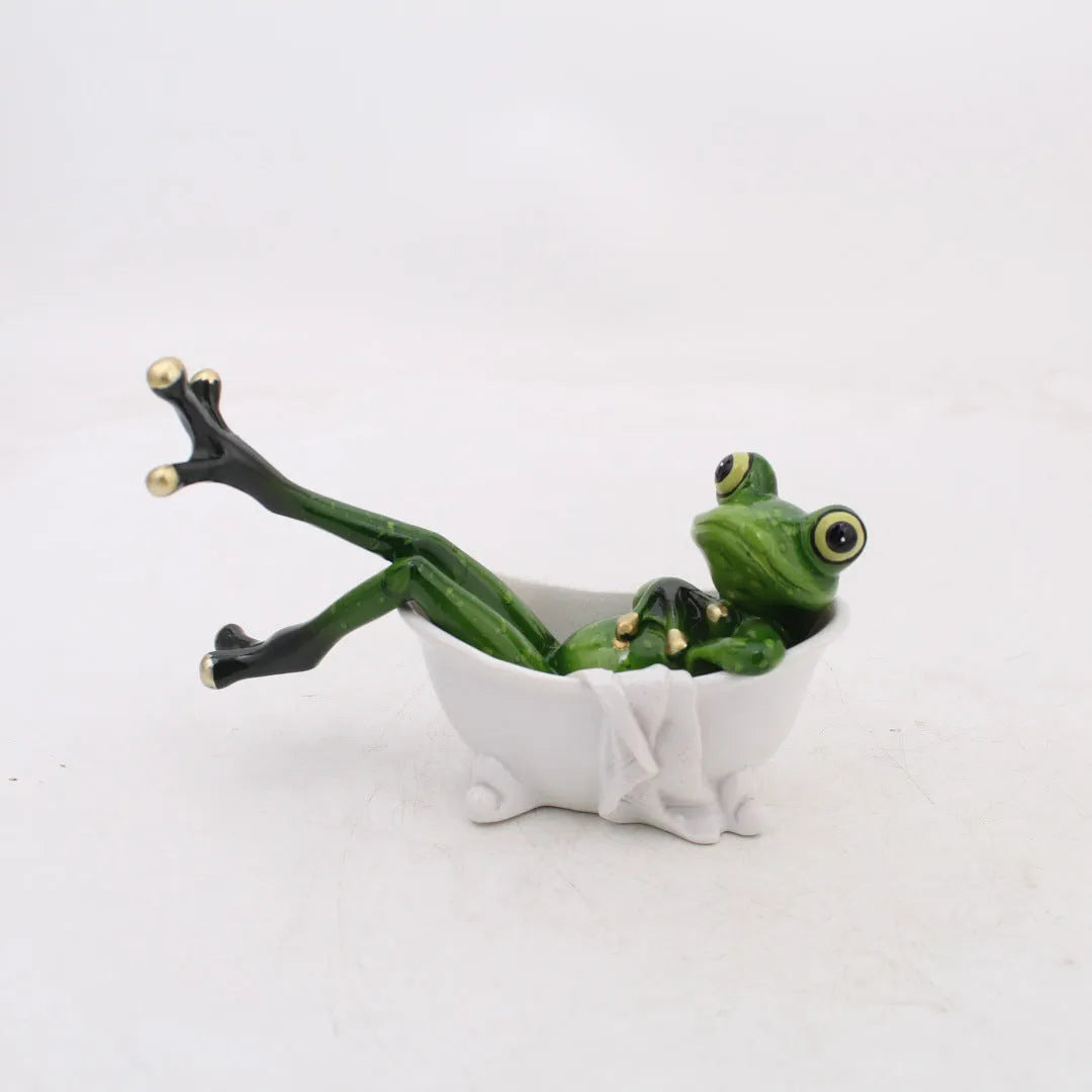 Pastoral style resin frog decoration on wooden shelf, showing hand-finished details and natural colour tones