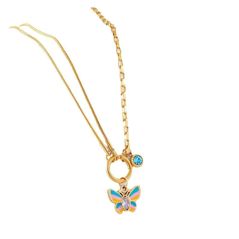 Gold titanium steel necklace and bracelet set with colourful epoxy butterfly and animal zodiac pendants.