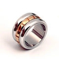 Gold titanium steel ring with rotating ultra-wide knuckle section shown in multiple size options