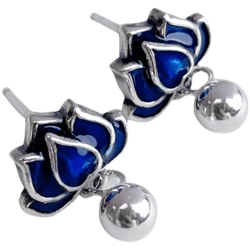Blue lotus earrings with retro artistic seedpod tassel design, 1.2cm wide alloy studs with silver needle fastening