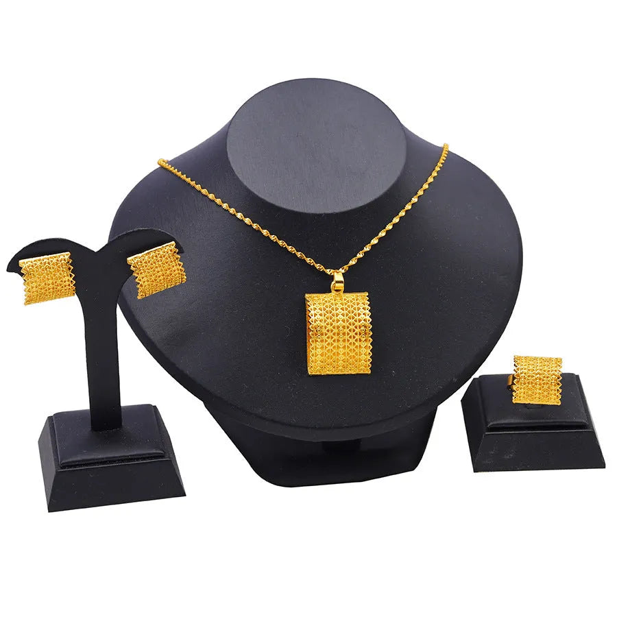 Golden colour bridal jewelry set with copper necklace, earrings, and ring combination