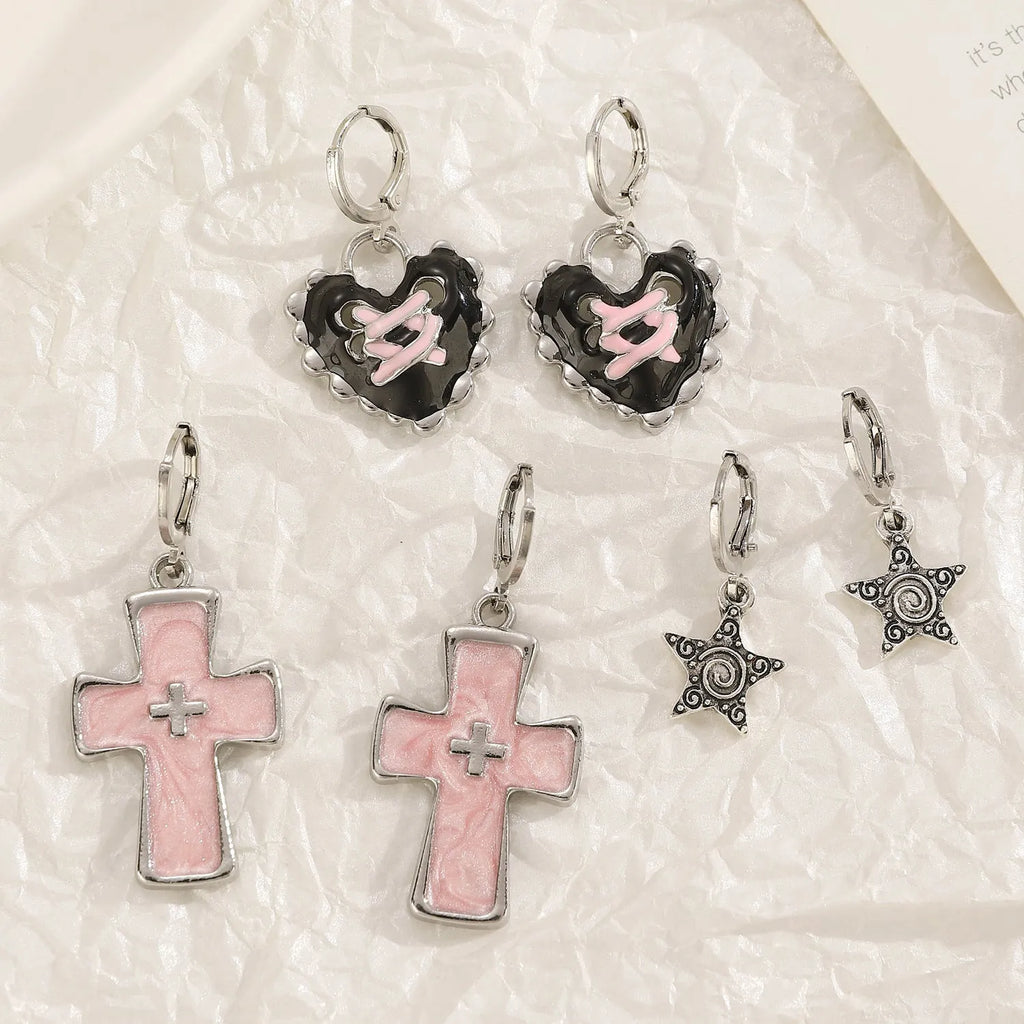 Women's alloy earrings with dripping oil treatment in five colour options showing cross and heart designs