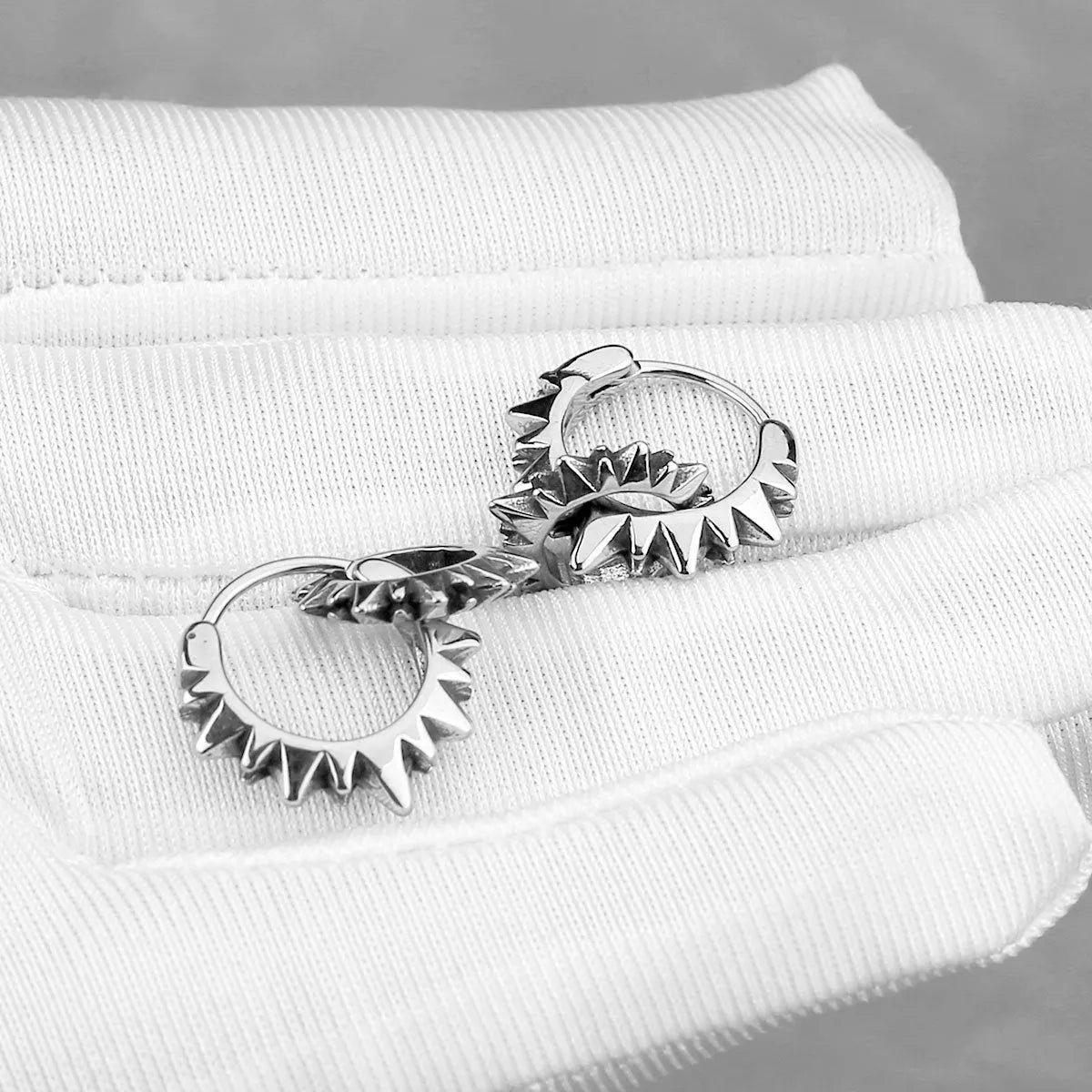 Stainless steel round ring earrings with polished steel colour finish, simple design