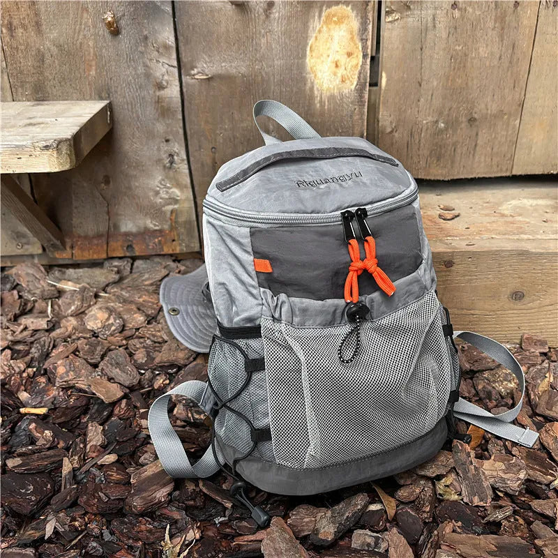 Japanese-style casual backpack in nylon with waterproof function and contrasting fold details