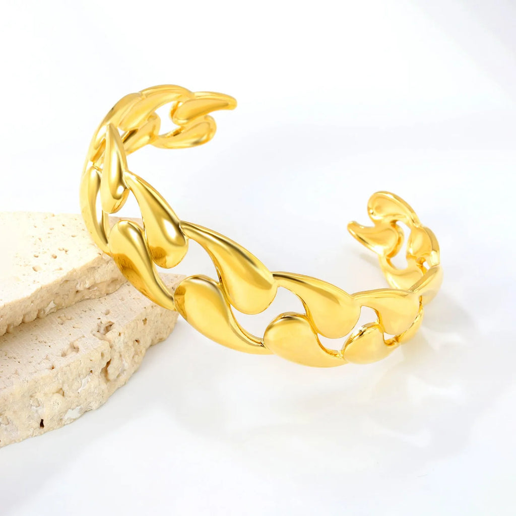 Stainless steel alloy bracelet with adjustable clasp in silver and gold colour finishes