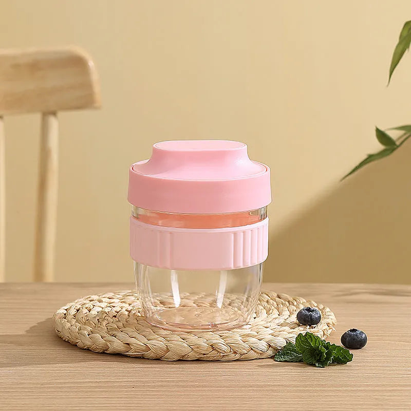 Green plastic salad cup with attached spoon lid showing 480ml capacity measurement