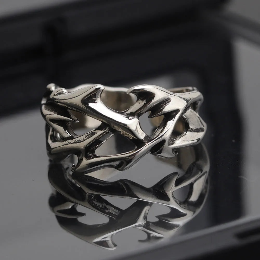 Thorn Flower Ring in J2150 thorns colour with geometric design and adjustable opening, made from copper for unisex fashion.