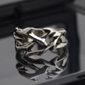 Thorn Flower Ring in J2150 thorns colour with geometric design and adjustable opening, made from copper for unisex fashion.