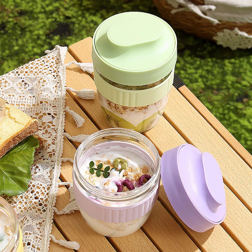 Green plastic salad cup with attached spoon lid showing 480ml capacity measurement