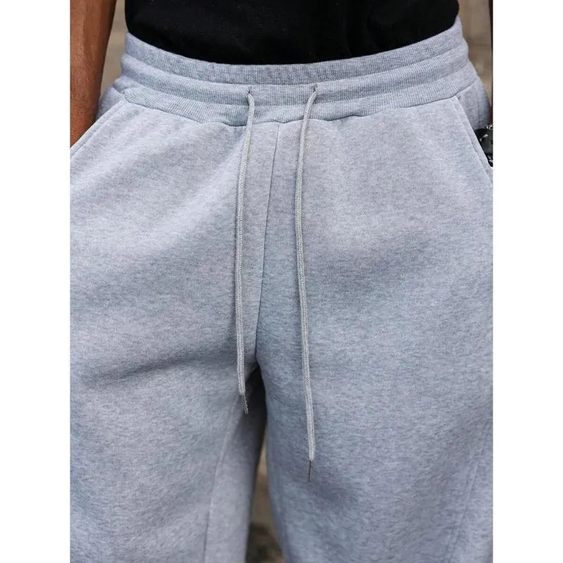 Men's straight high waist casual trousers in dark grey, showcasing cropped length and straight-leg silhouette.