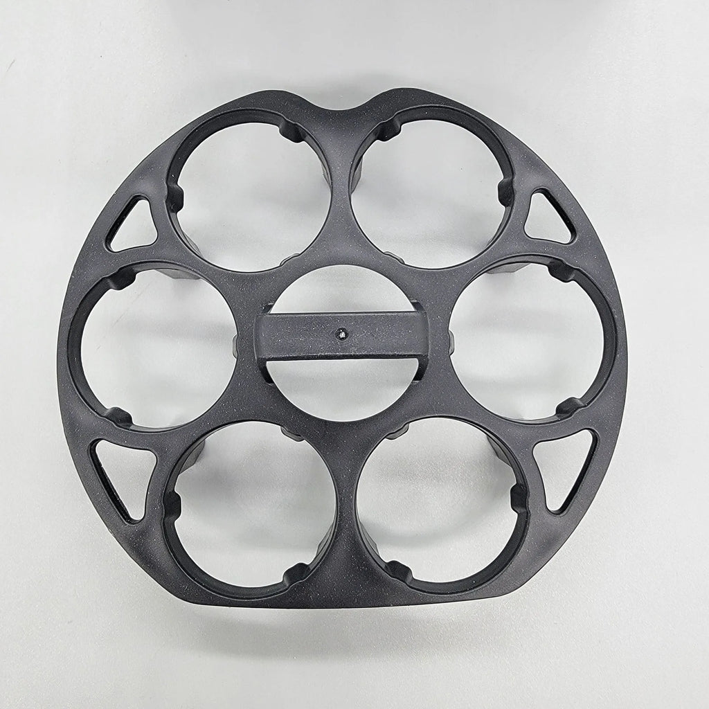 Black plastic egg holder measuring 13.8×12.6×5.7cm with retainer compartments for secure egg storage