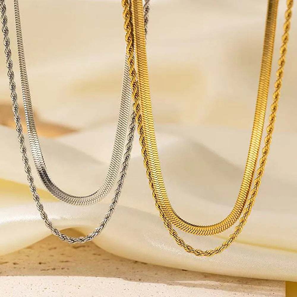 Adjustable double-layer twist necklace with geometric design on snake bones chain, showing 21-50cm length range
